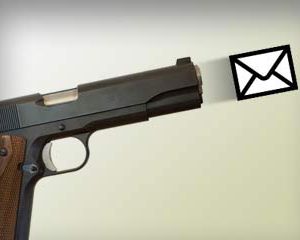 Email Marketing Strategy Depicted by a Gun Shooting an Email Symbol